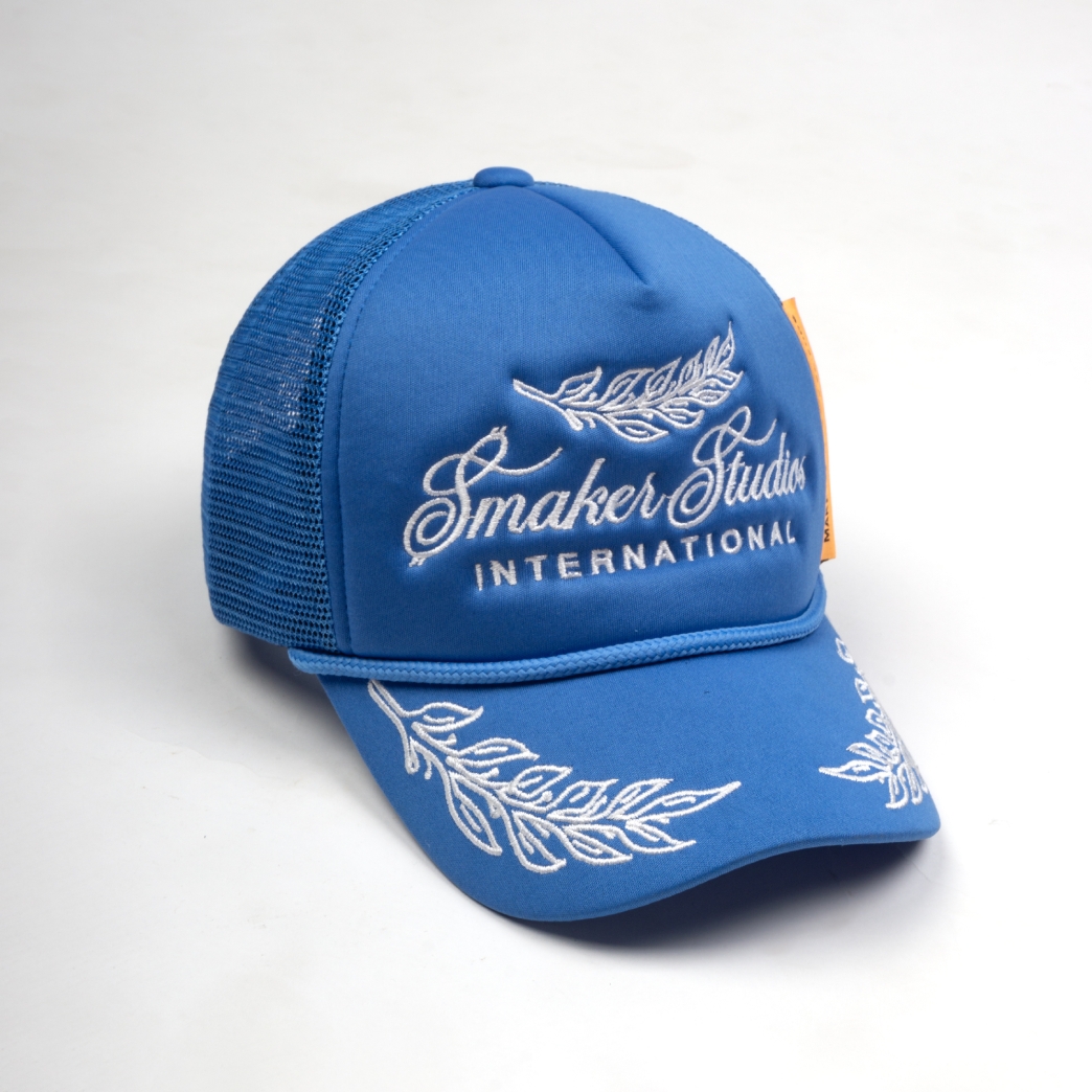 SMAKER STUDIO INTERNATIONAL TRUCK HAT IN BLUE