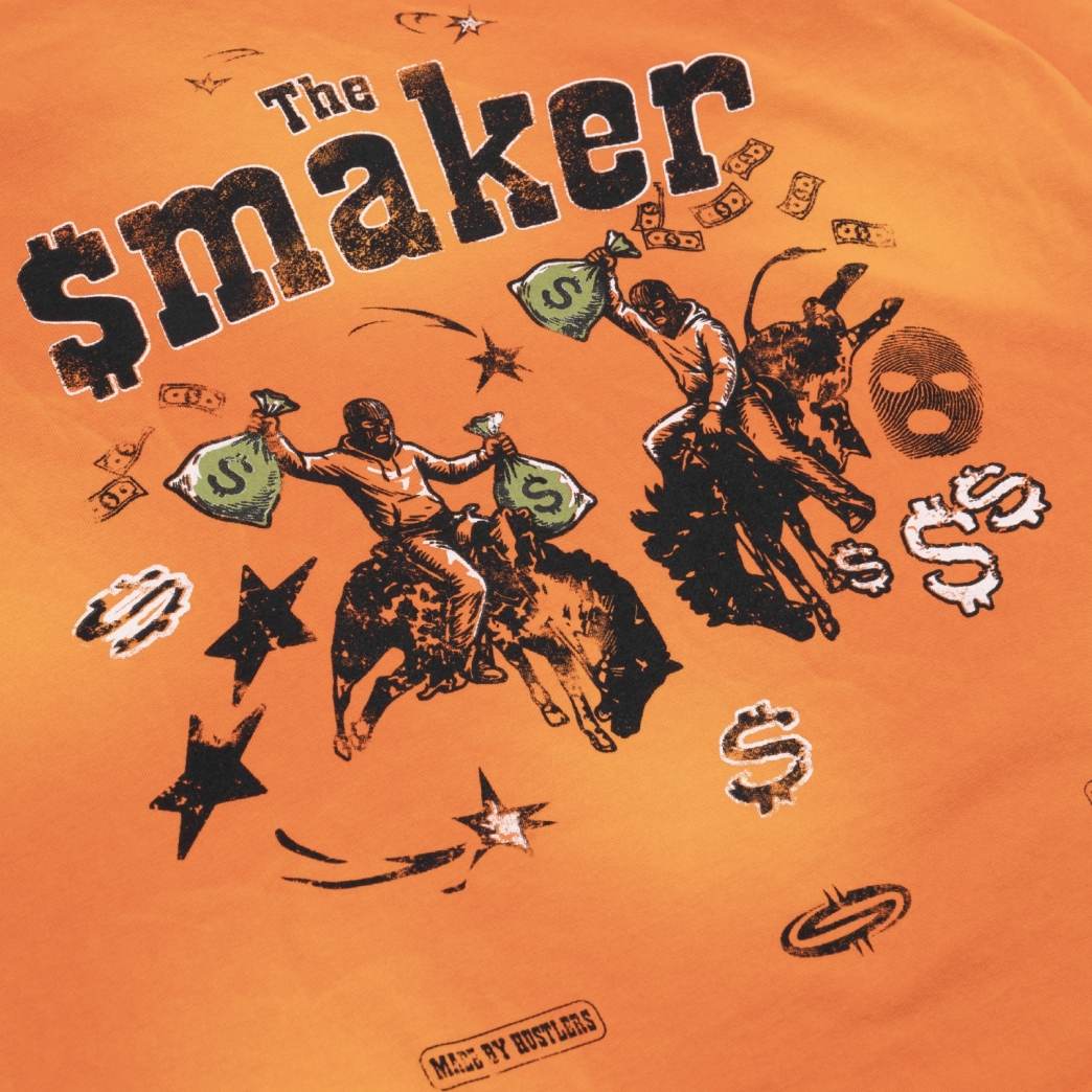 THE $MAKER COWBOYS WASHED TEE IN ORANGE