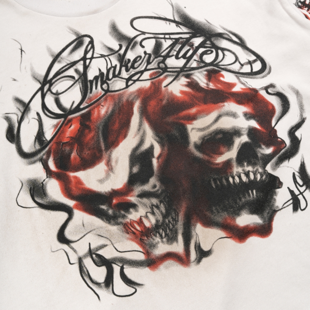 $4L SKULLS SWEATER IN CREAM