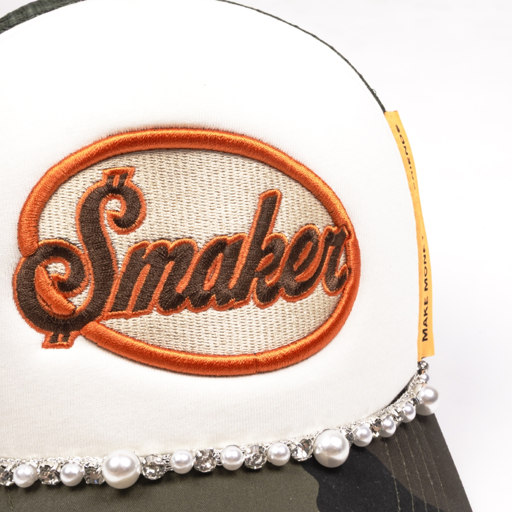$MAKER PEARL TRUCK HAT IN CAMO