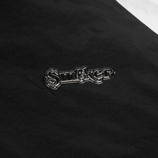 METAL LOGO WINDBREAKER NYLON JACKET IN BLACK
