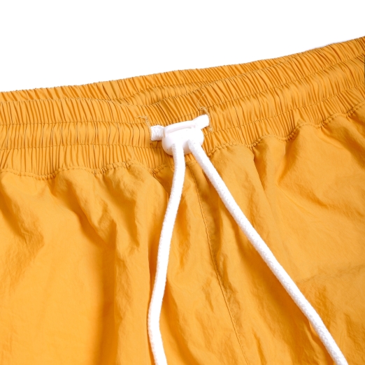 METAL LOGO WRINKLED NYLON SHORT IN YELLOW
