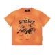 THE $MAKER COWBOYS WASHED TEE IN ORANGE
